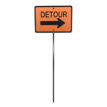 A detour sign stands upright with a clear indication to the right direction.