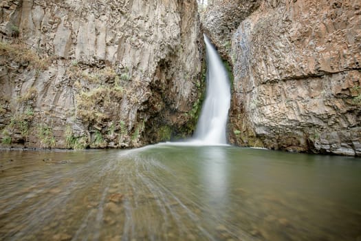 The beautiful Hawk Creek Falls northwest of Davenport Washington near the Spokane river meeting the Columbia River.