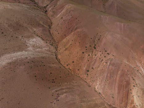 Aerial drone view of colorful eroded landform of Altai mountains in popular tourist location called Mars, Chagan-Uzun, Altai Republic, Russia
