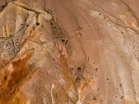Aerial drone view of colorful eroded landform of Altai mountains in popular tourist location called Mars, Chagan-Uzun, Altai Republic, Russia