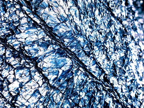 Stone isolated on transparent background. Phyllite A shiny phyllite with a crinkled surface and silvery sheen suspended to show its.