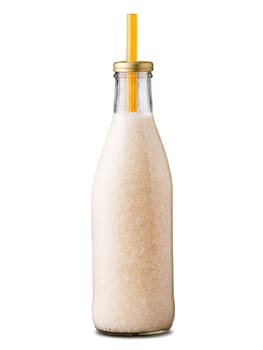 Spanish Horchata Glass bottle and straw showcasing the traditional rice based drink often served chilled. Drink isolated on transparent background.
