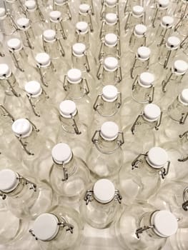 View of many empty glass bottle from above	 