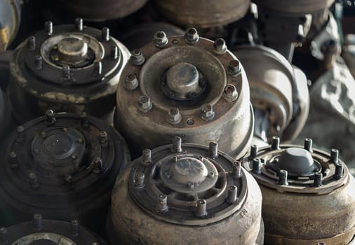 Close up of Old car axles and Many undercarriage parts at second hand parts car shop. Recycling, Copy space, Selective focus.