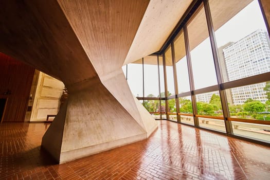 Image of Support beam for ceiling of Cathedral of Saint Mary of the Assumption with window view to outside