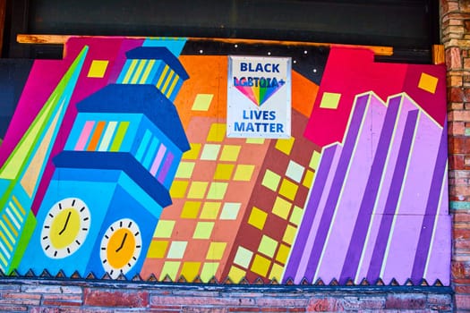 Image of Black and LGBTQIA+ lives matter on wall mural art in Castro District