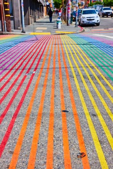 Image of Low view of rainbow crosswalk in Castro District on bright sunny day