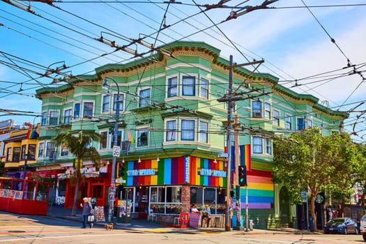 Image of Gyro Xpress with rainbow colors and banners on LGBTQIA+ street view