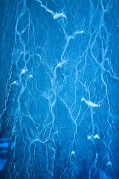 Image of Abstract background asset with blue and white lightning streaks or roots of white