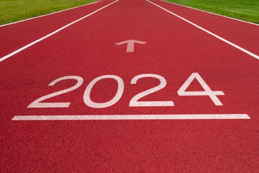Year 2024 concept, success year. Athletics track with text 2024. Concept of challenge or career path and change. Sport in New year.