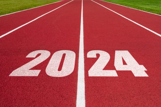 Year 2024 concept, success year. Athletics track with text 2024. Concept of challenge or career path and change. Sport in New year.