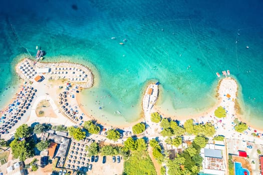 Idyllic turquoise beach in Punat aerial view, island of Krk, archipelago of Croatia