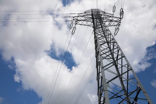 High voltage line pole truss. Long-distance electricity transmission line bracket. Energy management.