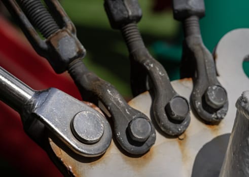 Detail of Open swage socket wire rope (Pendant Lines). Steel turnbuckle, Semi-macro metallic bits, Fastening and Connections concept, Space for text, Selective focus.