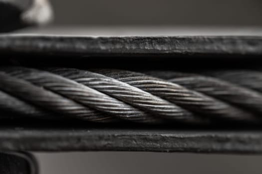 Close-up view of iron cable rope (Cable sling drum reels). Steel wire cable or rope for heavy industrial construction technology, Pattern Of Wire rope texture, Copy space, Selective Focus.
