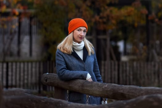 A beautiful woman in autumn in the park