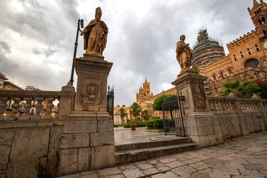 Garden and entry of famous Palermo Cathedral in Palermo, Italy