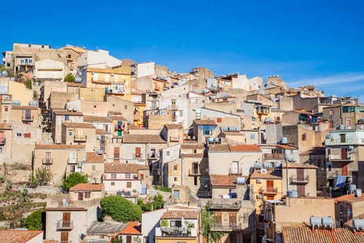 Facade of many houses on a hill