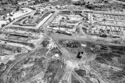 view from above of a big construction site with many heavy machines