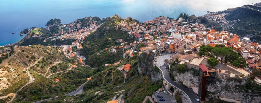 The coast of Calabria,hills of Taormina from Castelmola, Sicily, Italy
