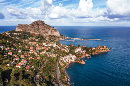 Aerial view of a coastline and big rock near Cefalu, Sicily, Italy.