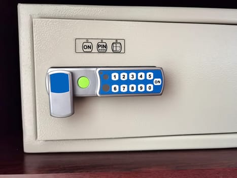 Safe hidden in the wardrobe. Home or hotel safe concept.