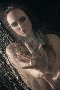 Gorgeous longhaired brunette shot nude in studio aquazone
