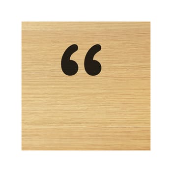 A quotation marks inverted commas sign wood block and on white with clipping path