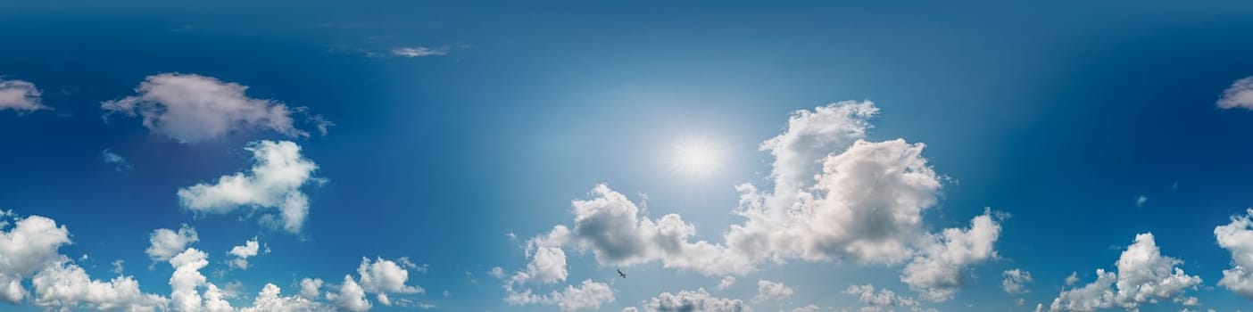 360 panorama of glowing sunset sky with bright Cirrus clouds. Seamless hdr spherical 360 panorama. Sky dome in 3D visualization, sky replacement for aerial drone panoramas. Weather and climate change.