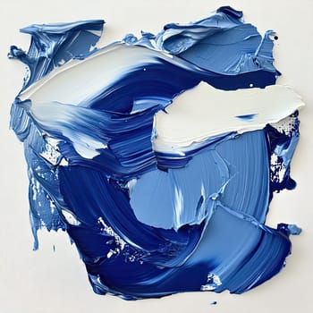 An artistic display of swirling blue and white paint on textured canvas, capturing the fluid and dynamic essence of the painter’s creativity and expression.
