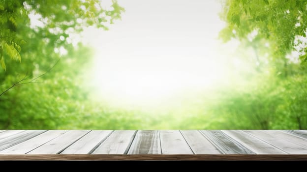 Empty wooden table with blurred green leaves background. Spring or summer backdrop for product display.