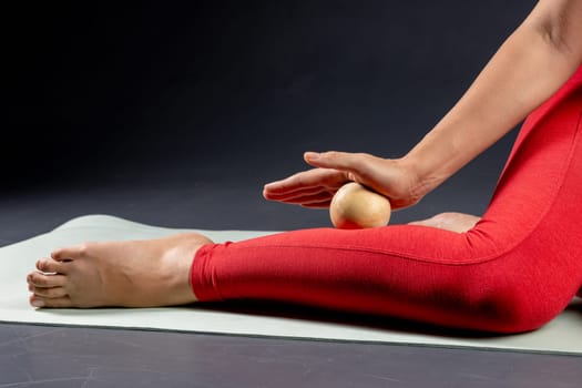Myofascial Release of Leg Muscles with Wooden Yoga Massage Ball. Prevent Leg Fatigue, Self Massage Tool