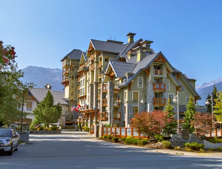 One of a resort residential building in Whistler on mountain and blue sky background.