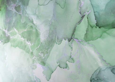 Delicate shades of green blend harmoniously, creating an abstract composition with fluid textures. This artwork evokes calmness and nature's beauty through gentle swirls.