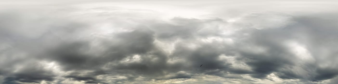 Dark moody rain clouds in dramatic overcast sky. Seamless 360 HDR spherical panorama. Full zenith or sky dome in 3D environment, sky replacement for aerial drone panoramas. Climate and weather change