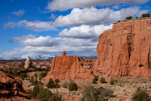 Experience the breathtaking beauty of Kodachrome Basin State Park in Utah, USA. The image captures striking red rock formations under a vibrant blue sky in this stunning desert landscape.