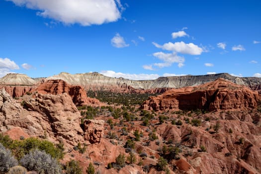 Explore the breathtaking red rock formations of Kodachrome Basin State Park, Utah. This captivating landscape features vibrant sandstone buttes set against a clear blue sky - USA