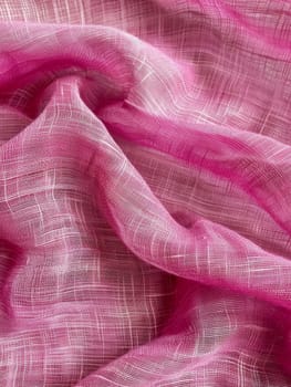 A close-up view of a vibrant pink gauze fabric, highlighting its delicate texture and intricate threadwork suitable for fashion and textile design