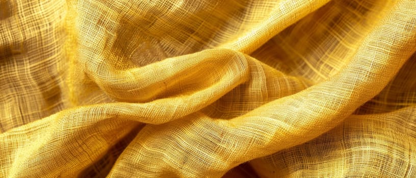 Swirling patterns of a luxe golden fabric with a mesmerizing texture, perfect for opulent design uses