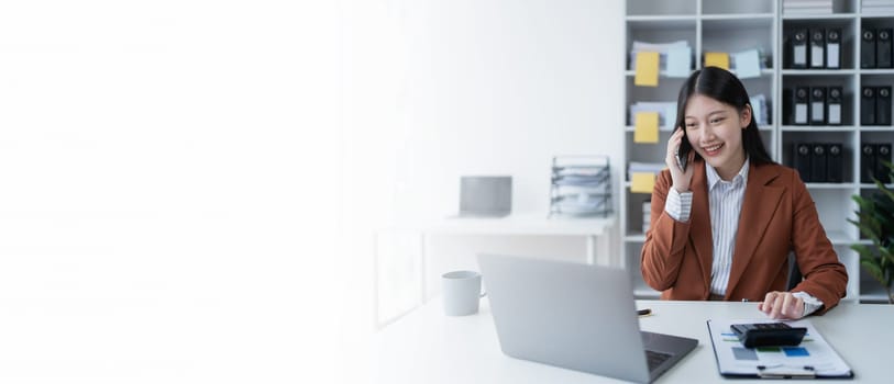 business woman using smartphone calling to plan a marketing strategy for finance with consult aiming to align financial goals with market opportunities.