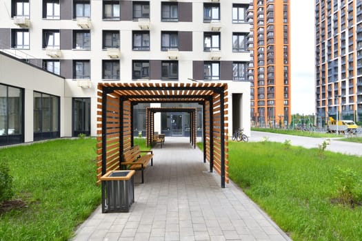 Recreation area with gazebos in area of new buildings in Moscow, Russia