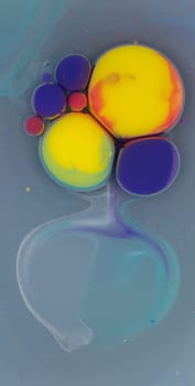 A mesmerizing arrangement of colorful bubbles in various sizes floats in a liquid medium, forming captivating patterns that draw the eye and spark curiosity.