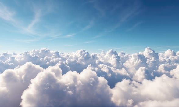 A photograph taken from a plane looking down at a sky filled with fluffy white clouds against a clear blue sky.