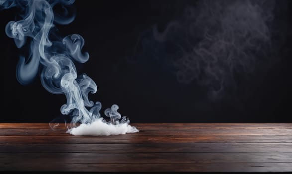 A plume of white smoke rises above a wooden table. It curls into shapes and dissipates into the darkness behind it.