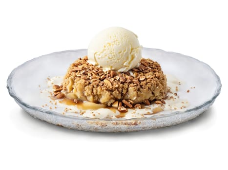 Autumn dessert apple crisp with cinnamon and nutmeg topped with vanilla ice cream served. Food isolated on transparent background.