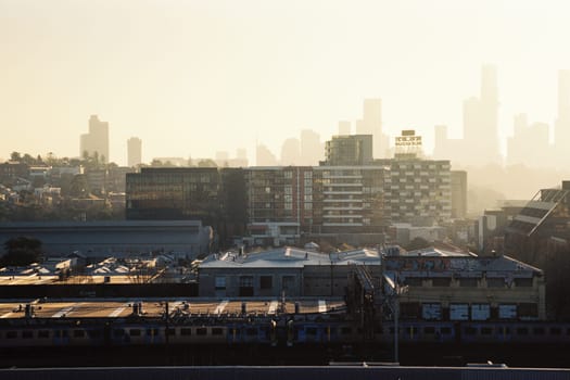 MELBOURNE, AUSTRALIA - JULY 31, 2024: View towards Melbourne skyline from a high rise building in Cremorne on a cold winter's afternoon in Australia. Shot with analogue film.