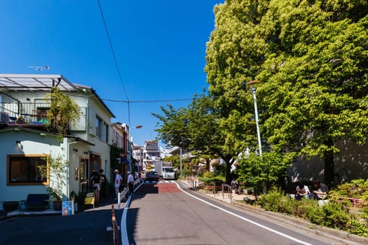 TOKYO, JAPAN - MAY 11, 2019 - Harajuku street life and shops near Cat St in central Tokyo, Japan