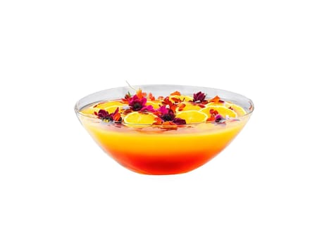 Scorpion Bowl A large bowl with layered orange and red liquid floating fruit slices and. Drink isolated on transparent background.