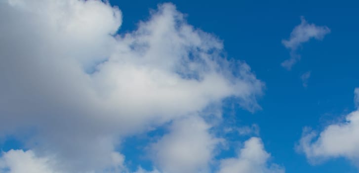 amazing blue background with light clouds.