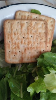 green salad vegetables food, cookie cracker. High quality photo